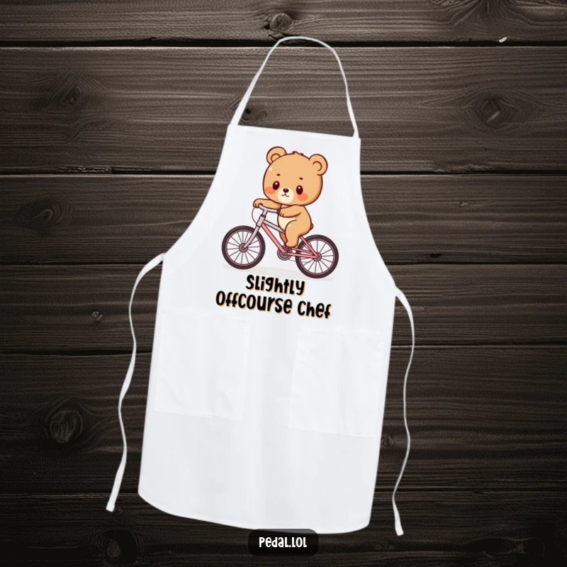 Funny Bear Cub Wobble Apron: A cute apron featuring a bear cub hilariously balancing on a bicycle, great for a funny kitchen gift.