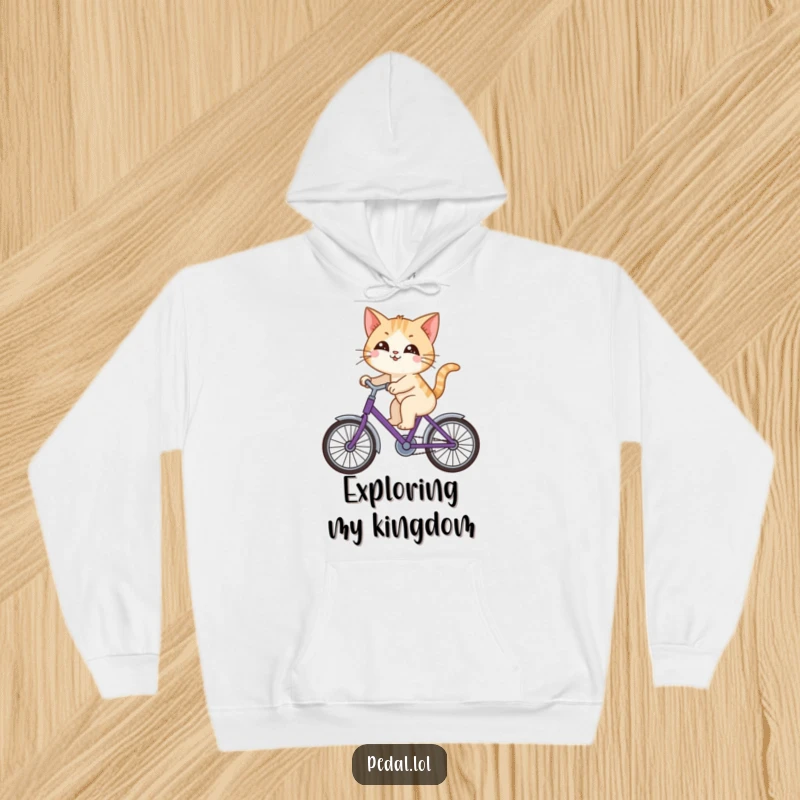 Funny cat happily riding a purple bicycle, looking around with curiosity, featured on this warm and humorous hoodie.