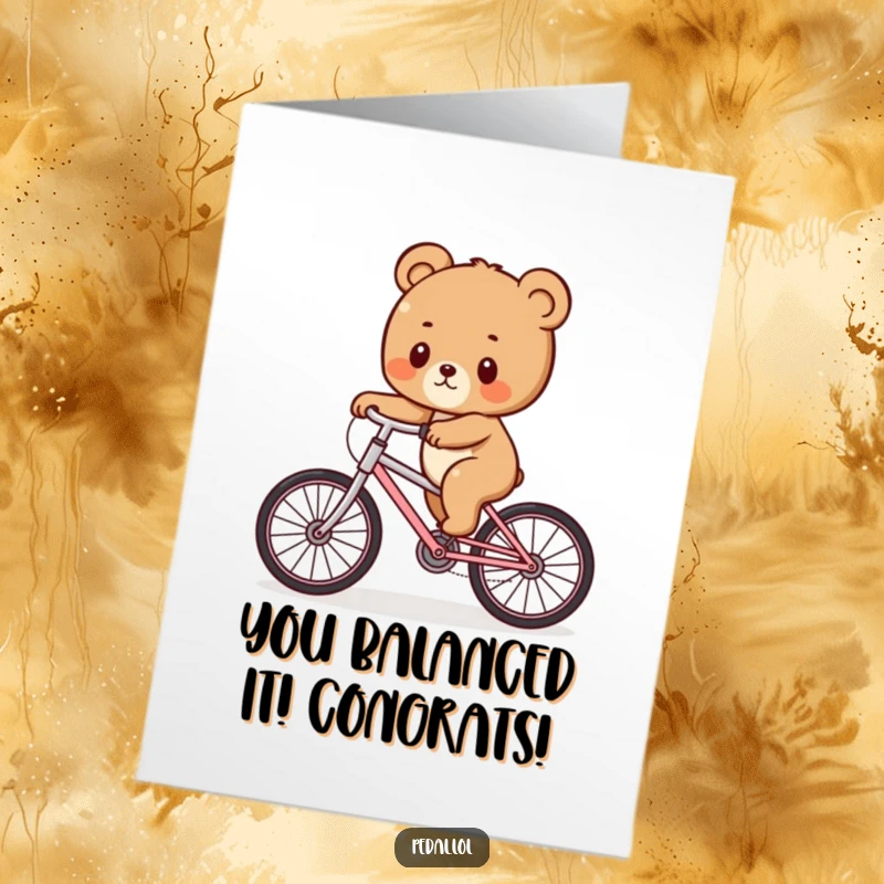 Funny free printable congratulations card featuring a cute bear cub humorously wobbling while trying to ride a bicycle.
