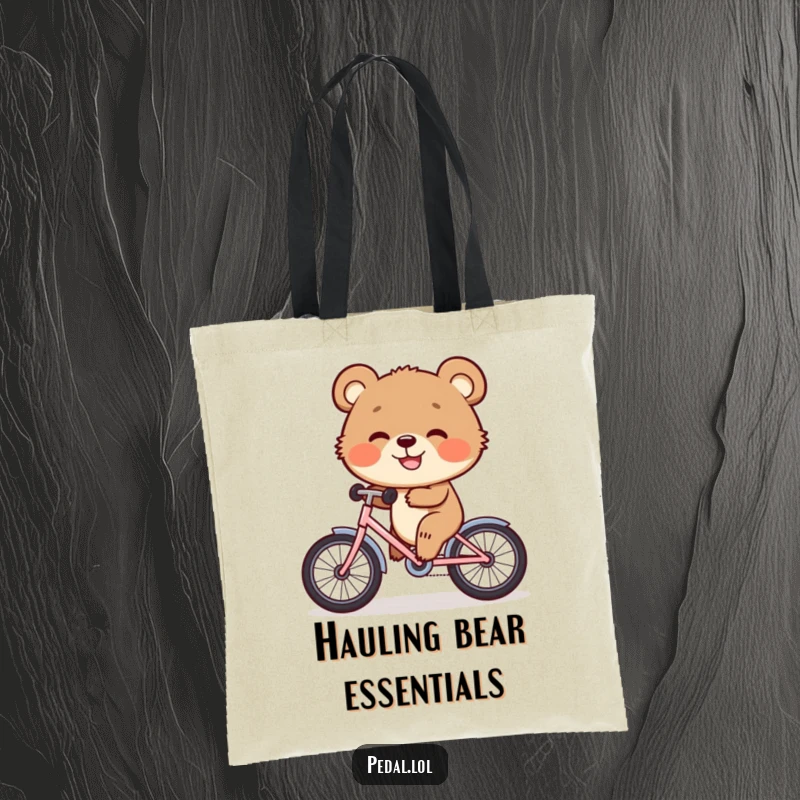 Funny Tote Bag: A happy bear cub pedals a miniature bicycle with a wide grin, making every trip a joyous ride.